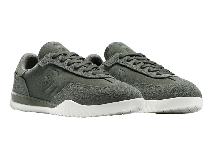 Tenis Converse Run Star Trainer color verde con suela blanca.