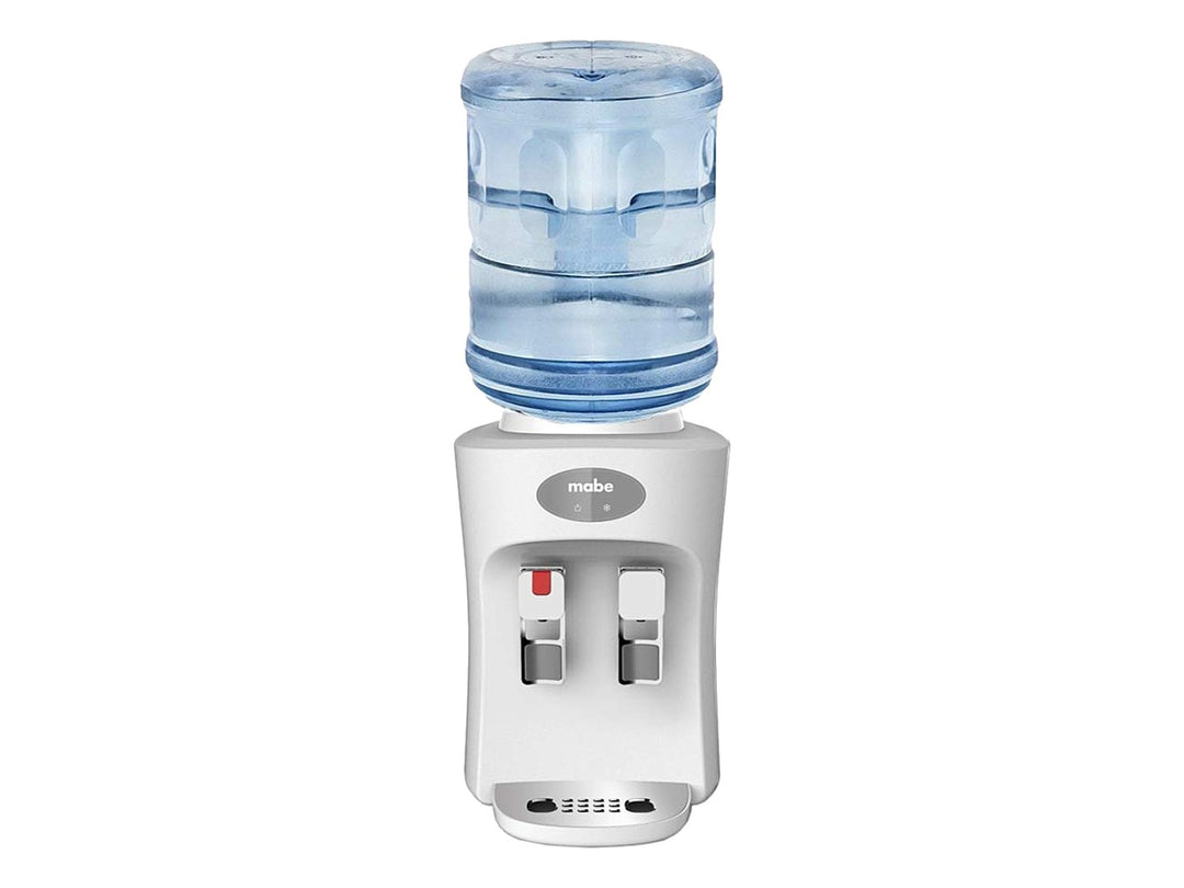 Enfriador de agua sobre mesa Mabe color blanco con dos grifos y bandeja de goteo