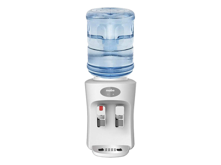 Enfriador de agua sobre mesa Mabe color blanco con dos grifos y bandeja de goteo