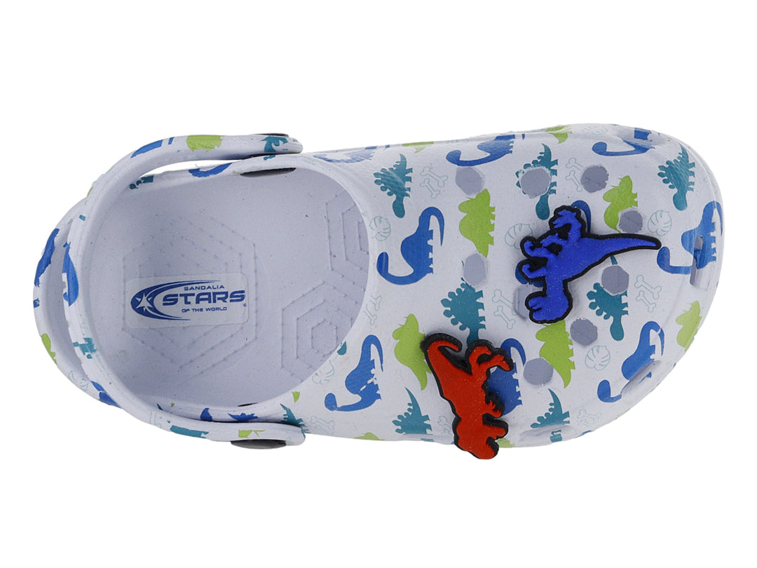 Zuecos blancos para niño con estampado de dinosaurios en azul y verde, incluyendo figuras decorativas en relieve.
