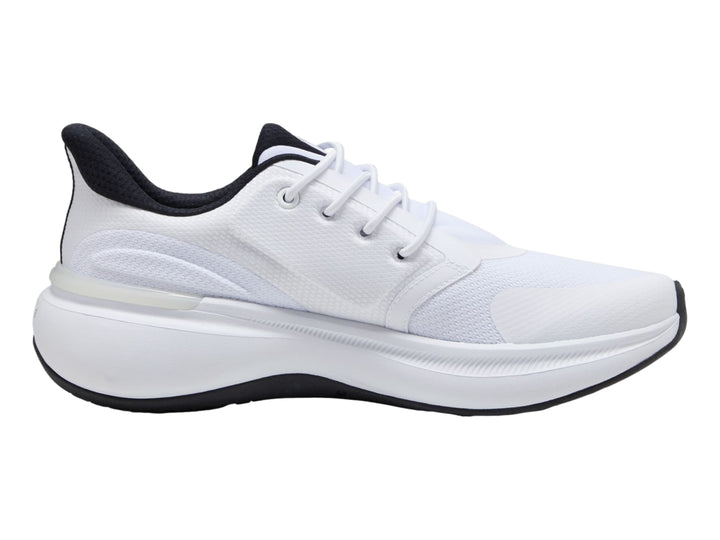 Tenis deportivos PUMA color blanco con detalles y suela en color negro.