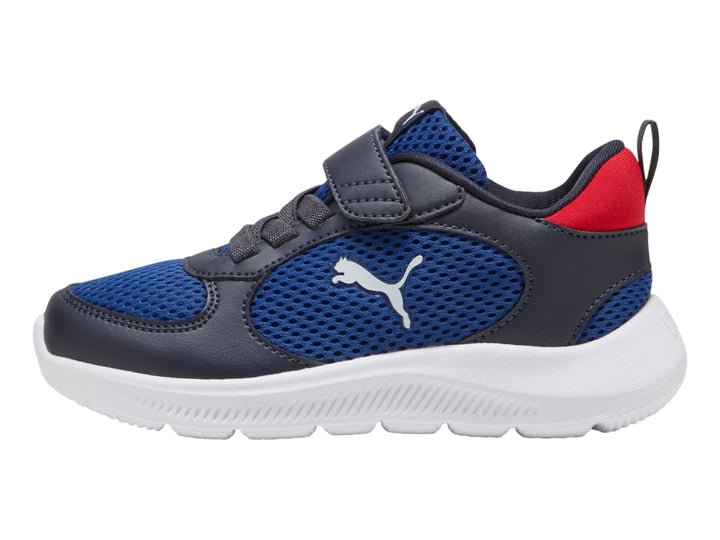 Tenis deportivos PUMA infantiles en azul marino y azul real con suela blanca y detalle rojo en el talón.