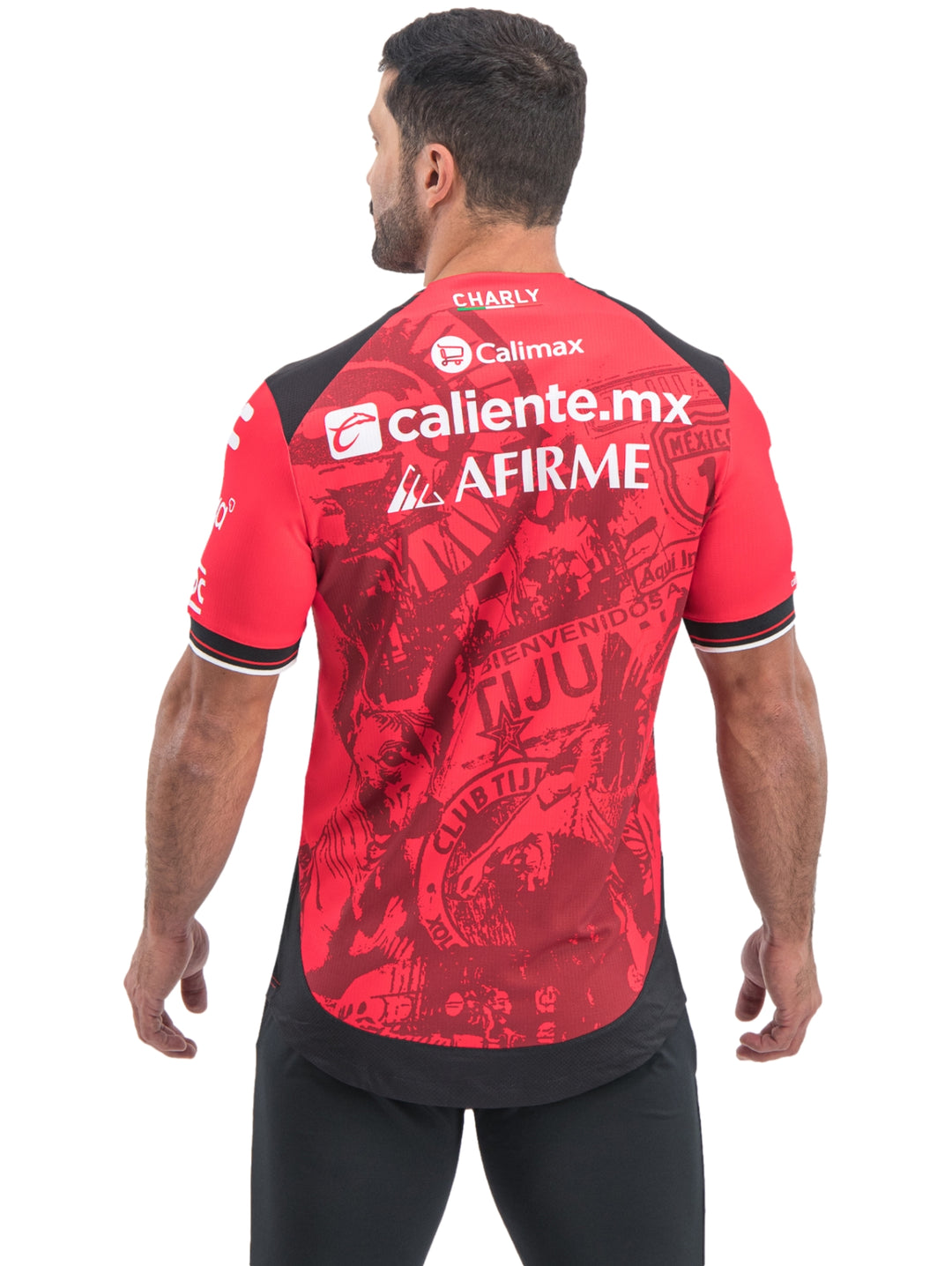 Jersey de fútbol Charly Xolos color rojo con detalles negros y blancos para hombre.