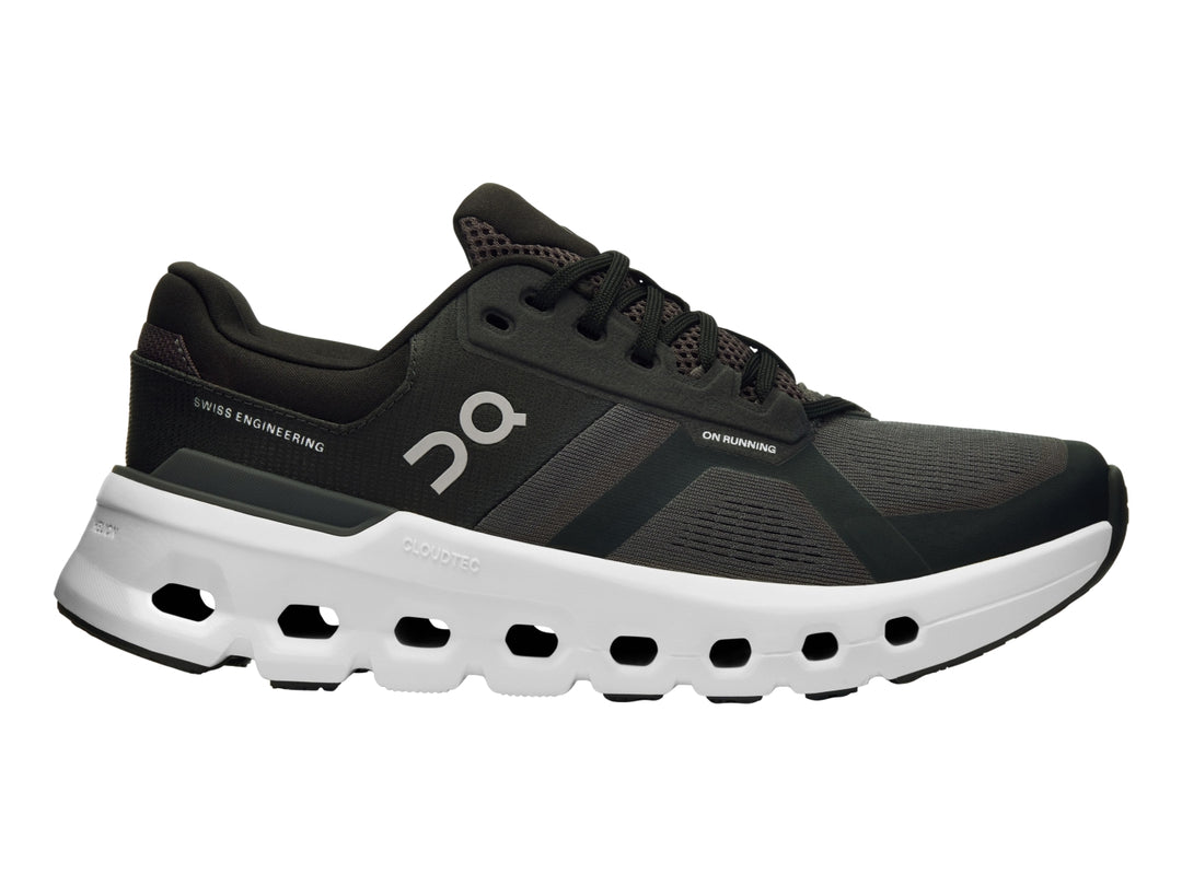 Tenis deportivos ON Cloudrunner 2 en color negro con suela blanca característica de diseño perforado.