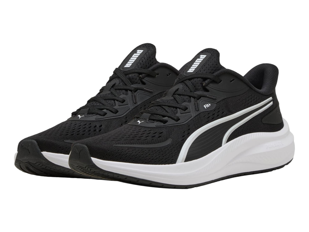 Tenis PUMA Skyrocket Lite 2 en color negro con suela blanca y detalles en plata, vista lateral.