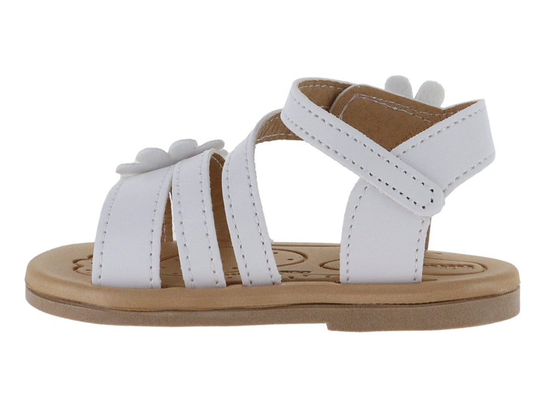 Sandalia blanca para niña con adornos de flores y suela color café.