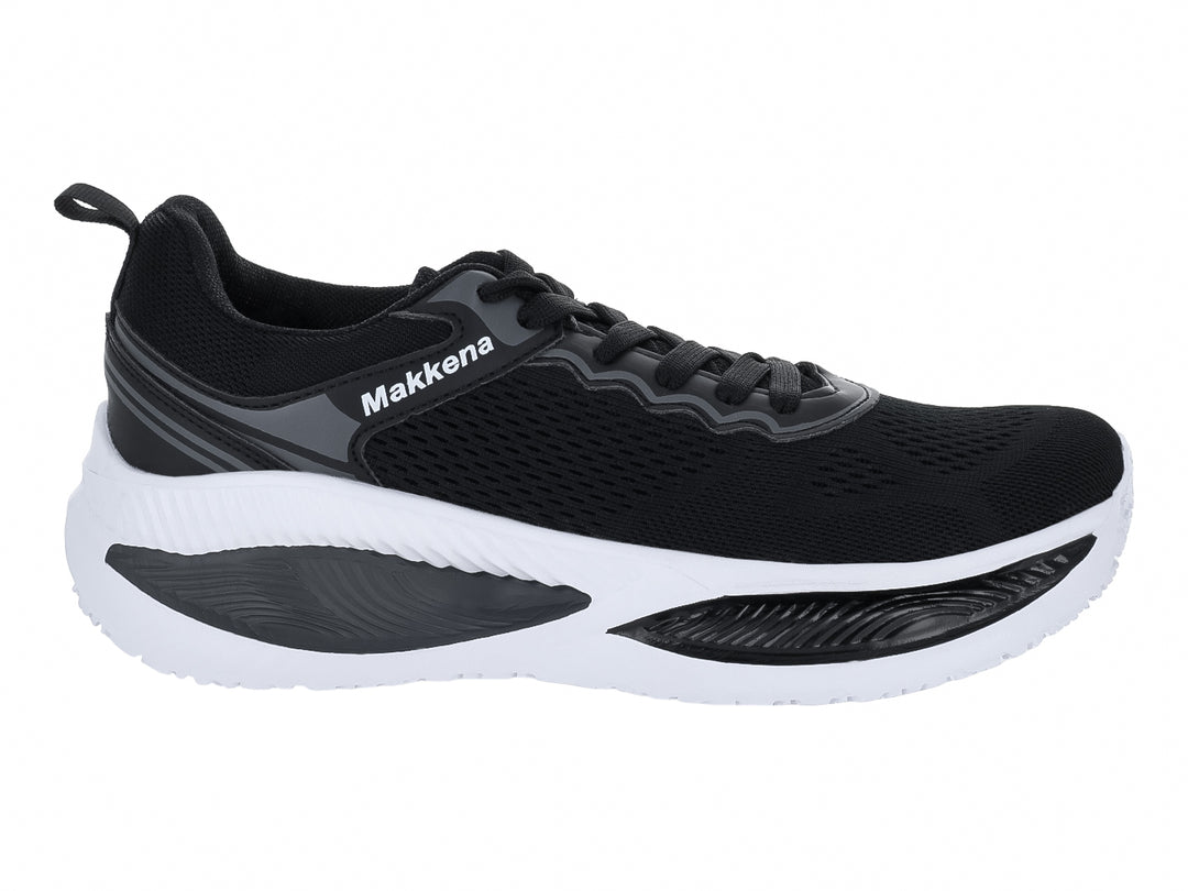Tenis deportivos color negro con suela blanca y detalles en gris.