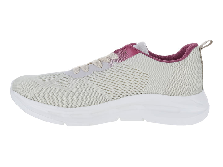 Tenis deportivos Makena color latte con detalles en púrpura y suela blanca.