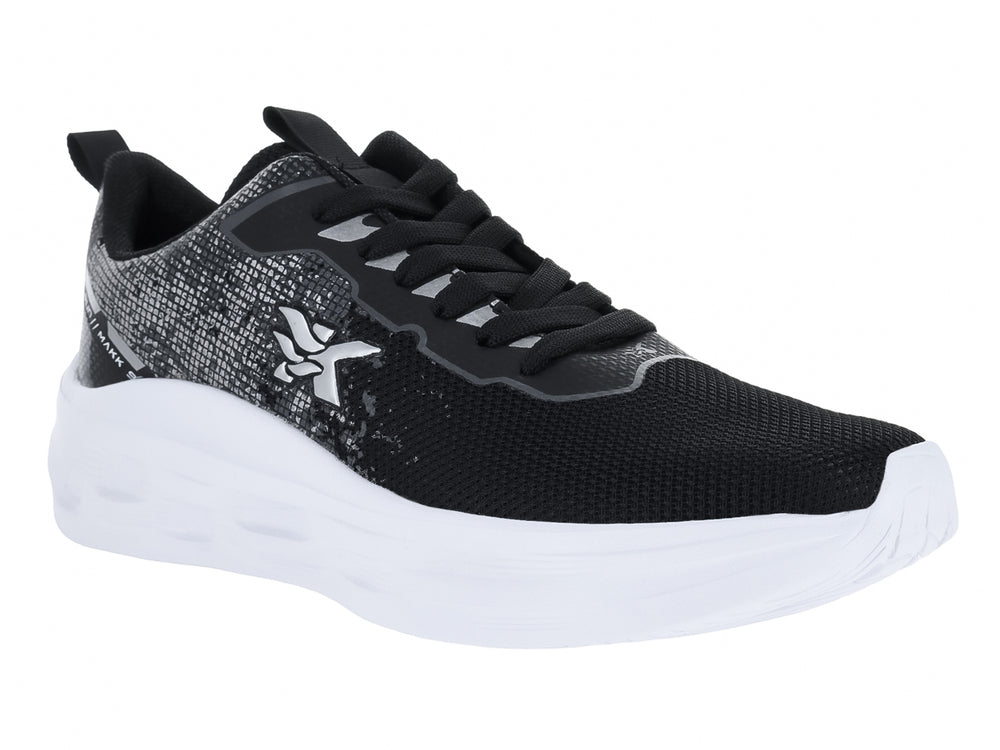 Tenis deportivos marca Makena en color negro con suela blanca y detalles gráficos laterales.