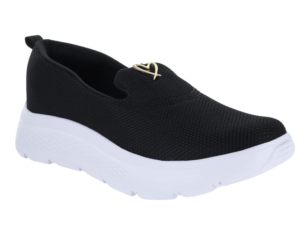 Tenis slip-on de color negro con suela blanca gruesa y tejido transpirable.