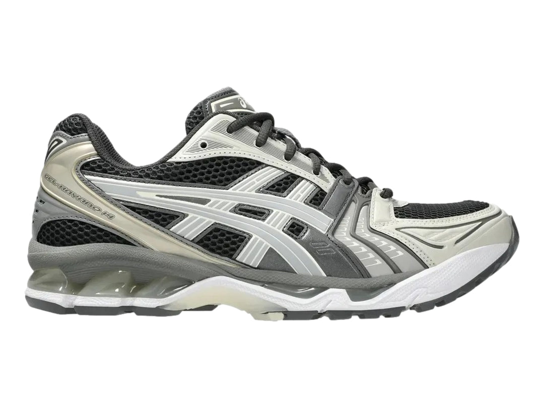 Tenis deportivos ASICS Gel-Kayano 14 en colores gris, blanco y negro con suela amortiguada.
