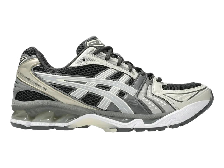 Tenis deportivos ASICS Gel-Kayano 14 en colores gris, blanco y negro con suela amortiguada.