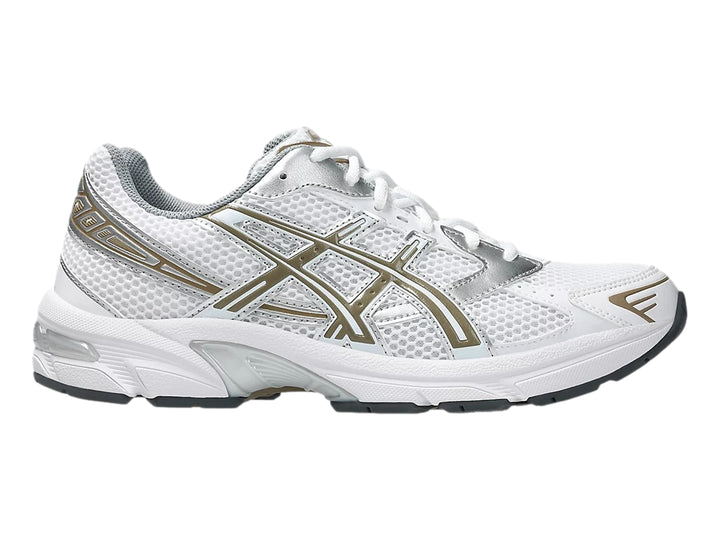 Tenis deportivos ASICS GEL-1130 en color blanco con detalles dorados y plateados sobre fondo blanco.
