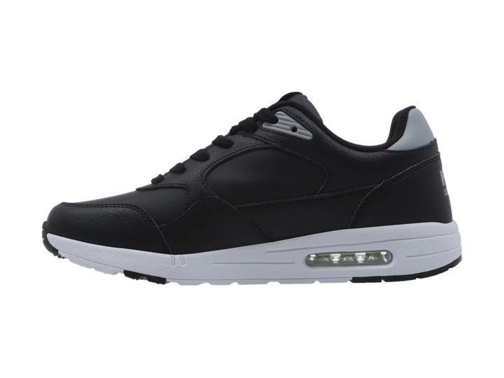 Tenis K-Swiss Maxwell en color negro con suela blanca y detalles en gris.