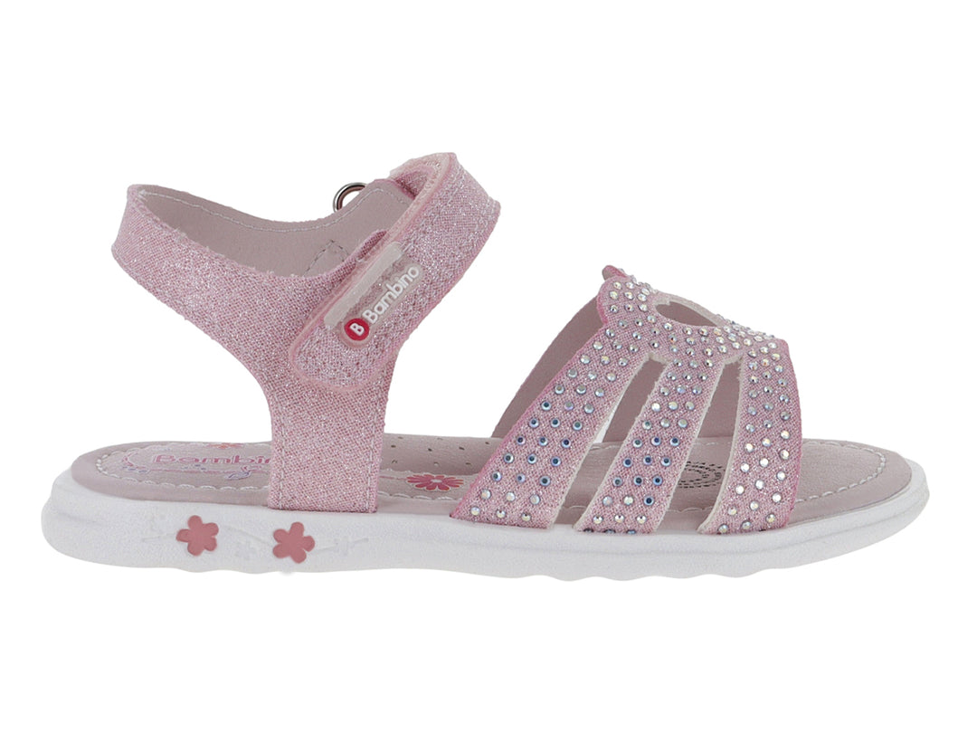 Sandalia rosa para niña con acabado brillante, detalles de pedrería y suela blanca con flores.