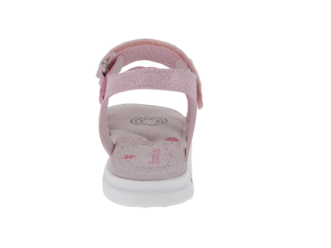 Sandalia rosa para niña con acabado brillante, detalles de pedrería y suela blanca con flores.