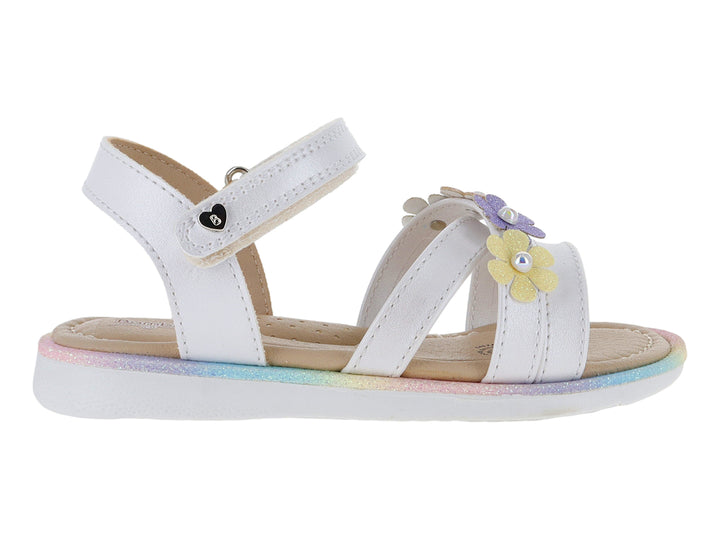 Sandalia blanca para niña con adornos de flores amarillas y moradas, y suela con degradado multicolor.