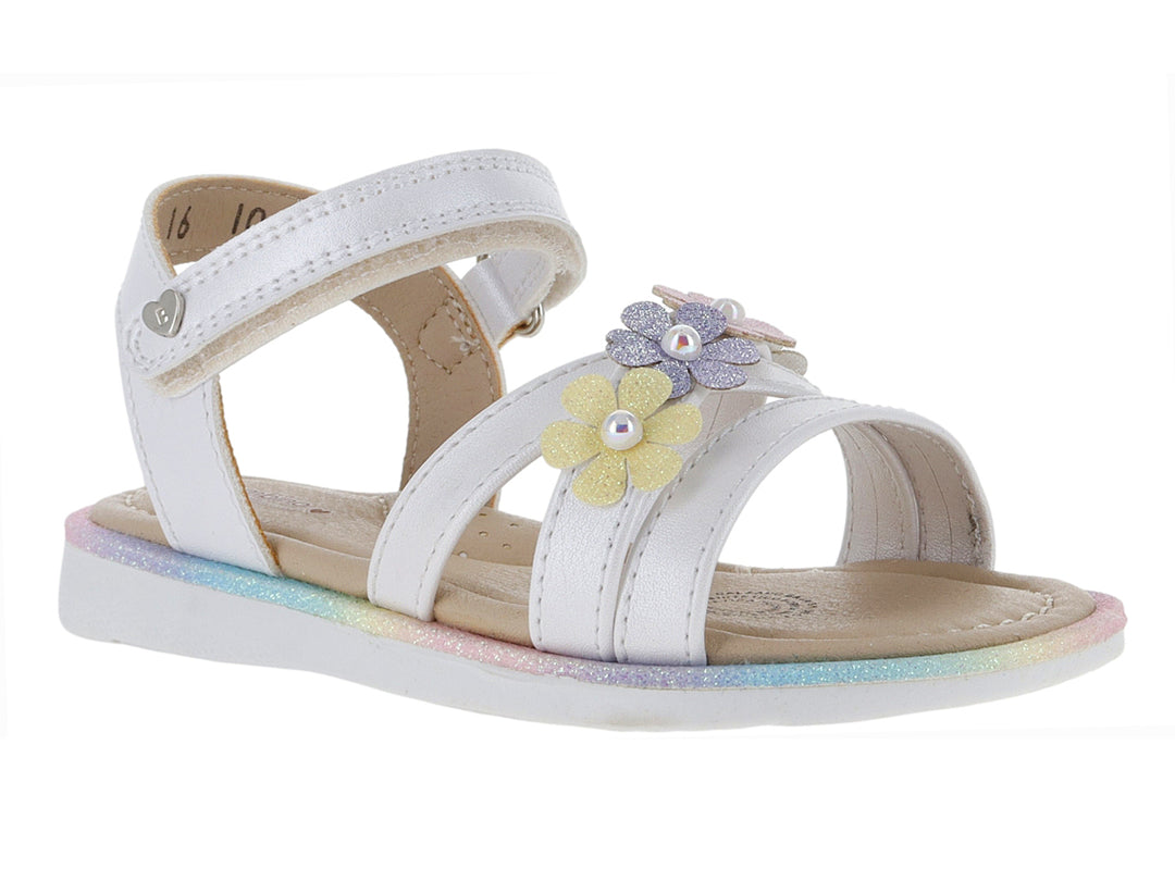 Sandalia blanca para niña con adornos de flores amarillas y moradas, y suela con degradado multicolor.