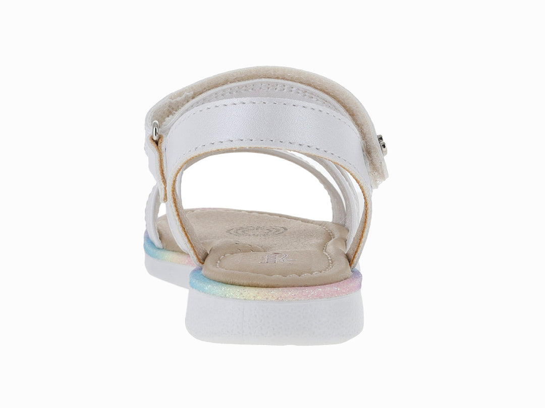 Sandalia blanca para niña con adornos de flores amarillas y moradas, y suela con degradado multicolor.