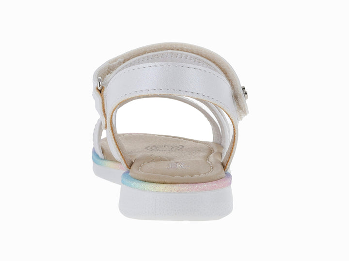 Sandalia blanca para niña con adornos de flores amarillas y moradas, y suela con degradado multicolor.