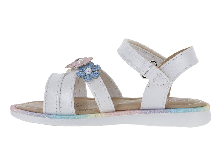 Sandalia blanca para niña con adornos de flores amarillas y moradas, y suela con degradado multicolor.