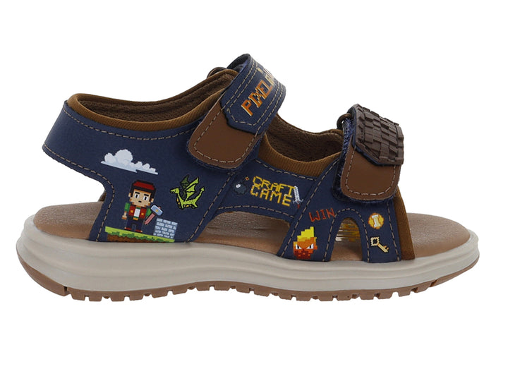 Sandalia infantil color marino con detalles en café y estampados de personajes estilo pixel art.