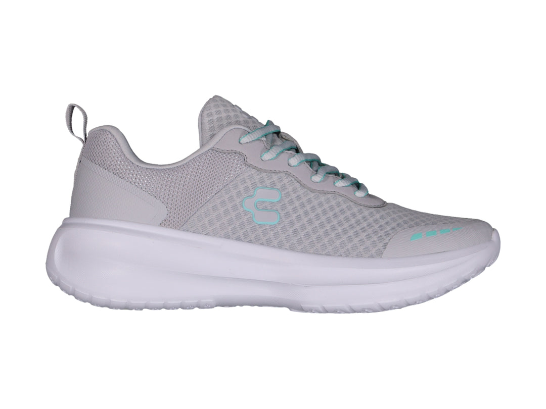 Tenis deportivos Charly color gris con suela blanca y detalles en color aqua.
