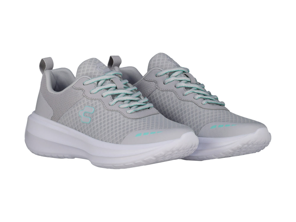Tenis deportivos Charly color gris con suela blanca y detalles en color aqua.