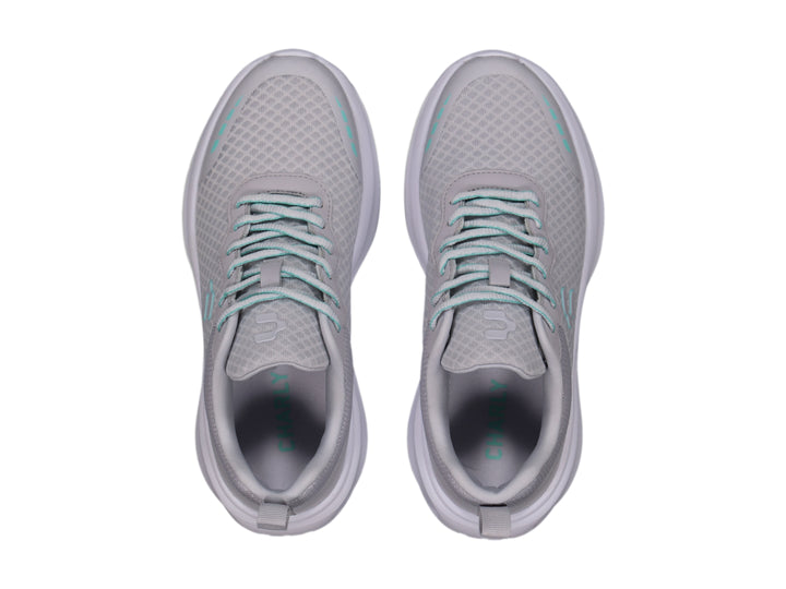 Tenis deportivos Charly color gris con suela blanca y detalles en color aqua.