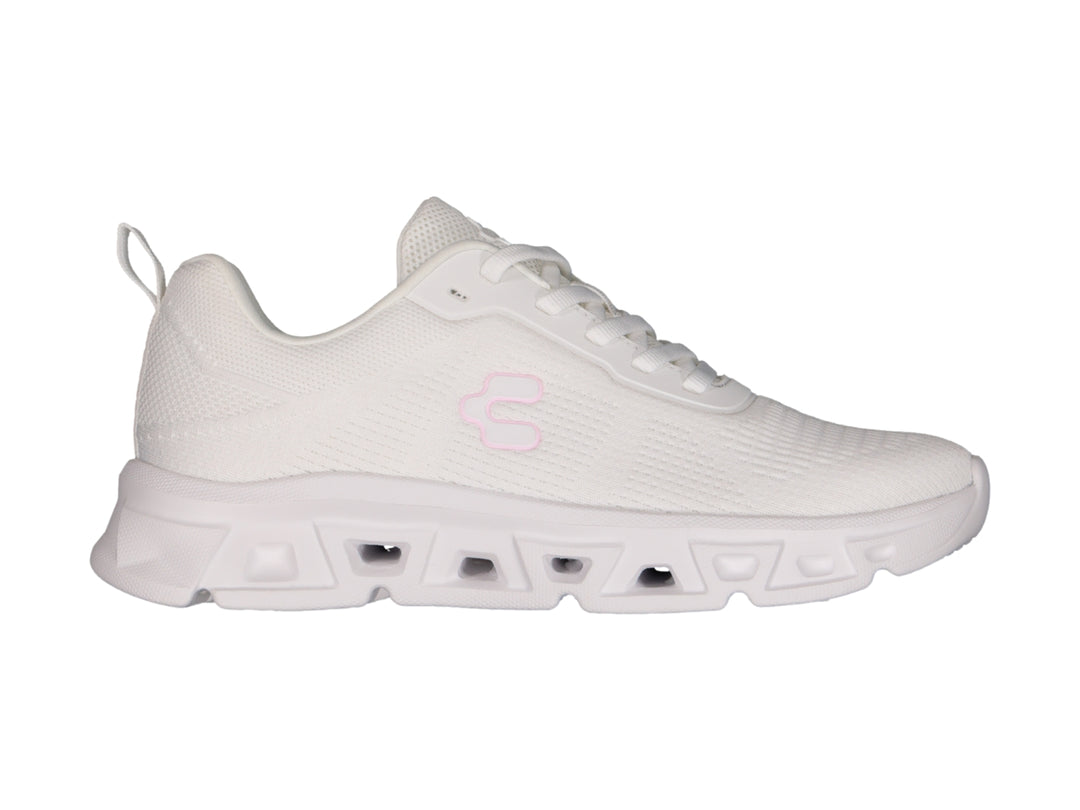 Tenis deportivos Charly color blanco con detalles en rosa y suela blanca robusta.