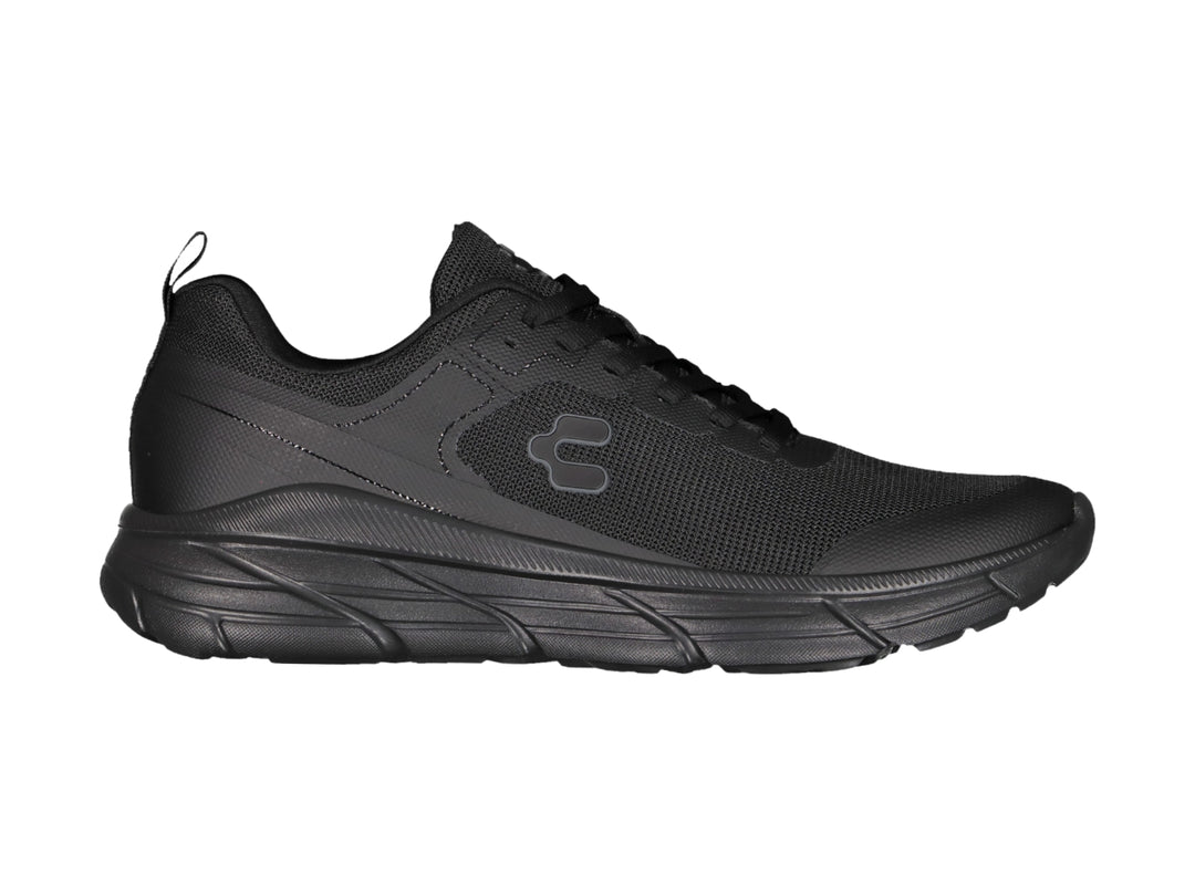 Tenis deportivos Charly color negro total con suela robusta y parte superior de malla transpirable.