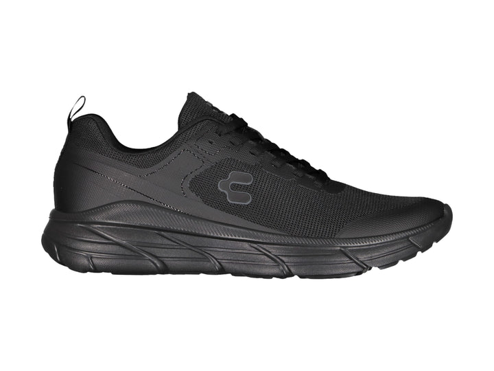 Tenis deportivos Charly color negro total con suela robusta y parte superior de malla transpirable.