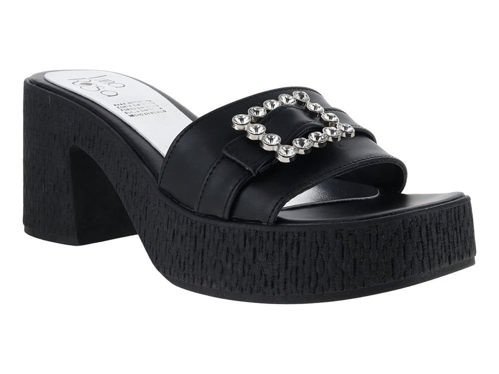 Sandalia negra de plataforma con tacón grueso y hebilla decorativa plateada.