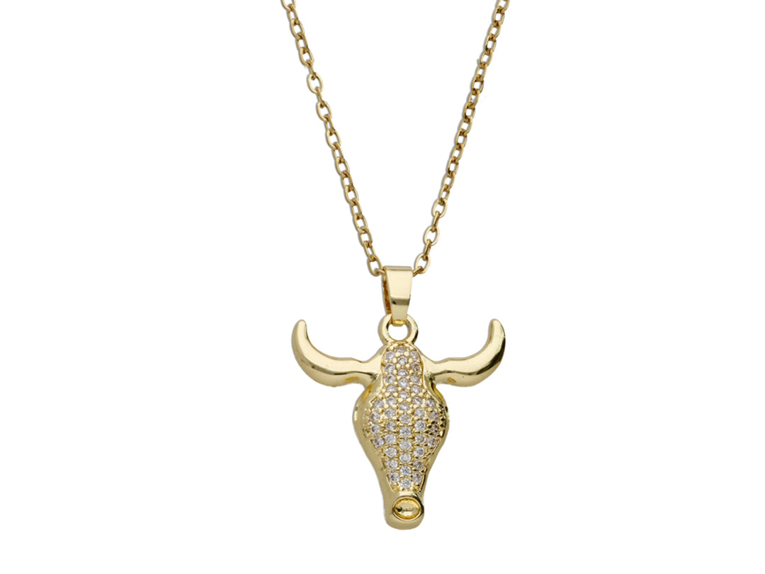 Collar dorado de la marca ROZE con dije en forma de cabeza de toro adornada con brillantes.