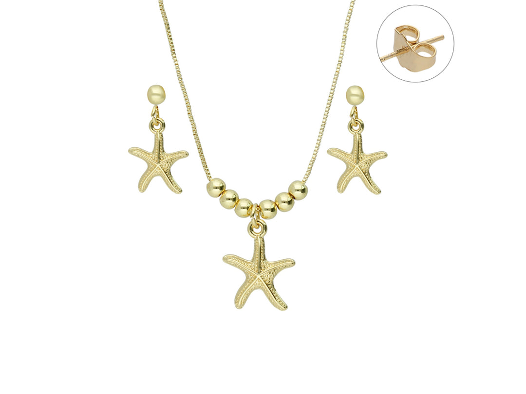Set de joyería dorado compuesto por un collar y aretes con dijes en forma de estrella de mar.
