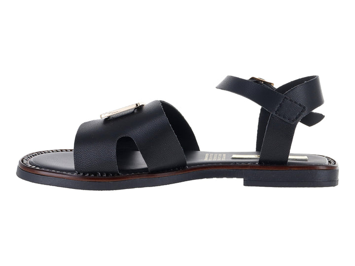 Sandalia plana color negro para Mujer con hebilla dorada y adorno frontal.