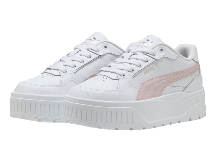 Tenis PUMA Carmen II Idol en color blanco con detalle lateral en plata y suela de plataforma blanca.