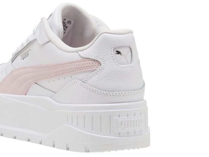 Tenis PUMA Carmen II Idol en color blanco con detalle lateral en plata y suela de plataforma blanca.
