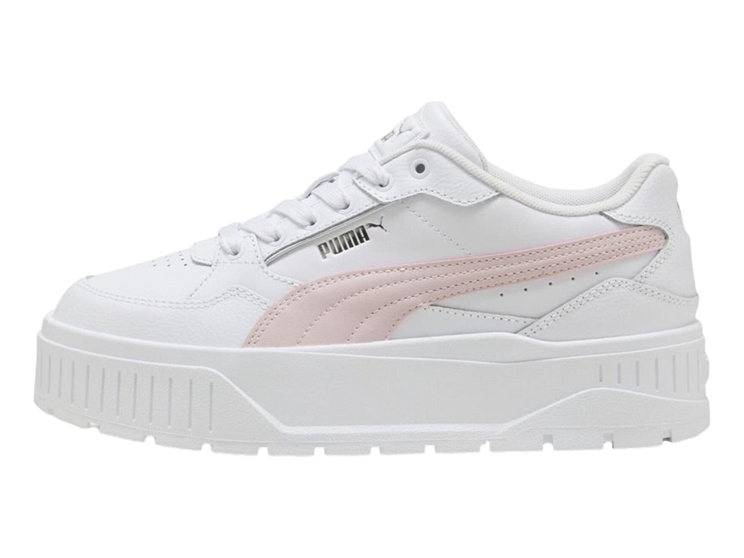 Tenis PUMA Carmen II Idol en color blanco con detalle lateral en plata y suela de plataforma blanca.