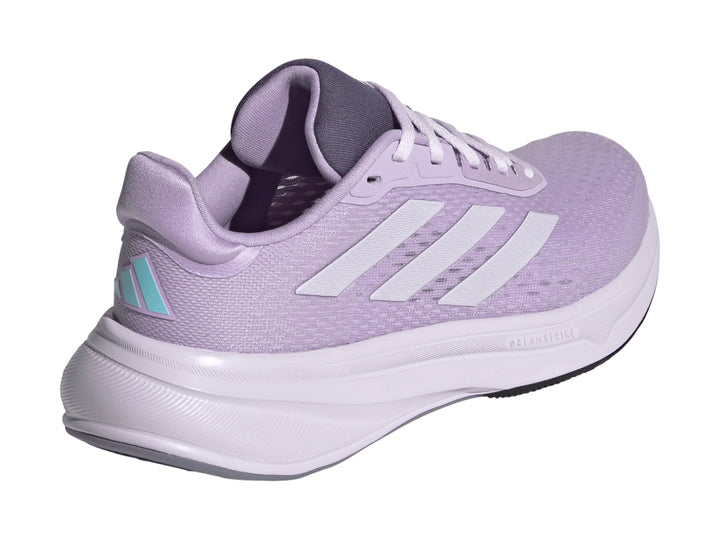 Tenis deportivos Adidas Response Super en color morado claro para mujer.