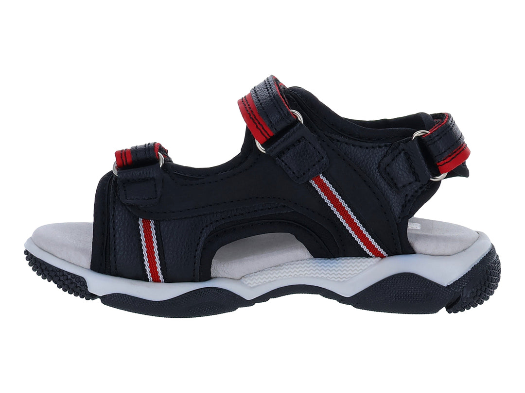 Sandalia New Boys color negro con detalles en rojo y suela blanca.