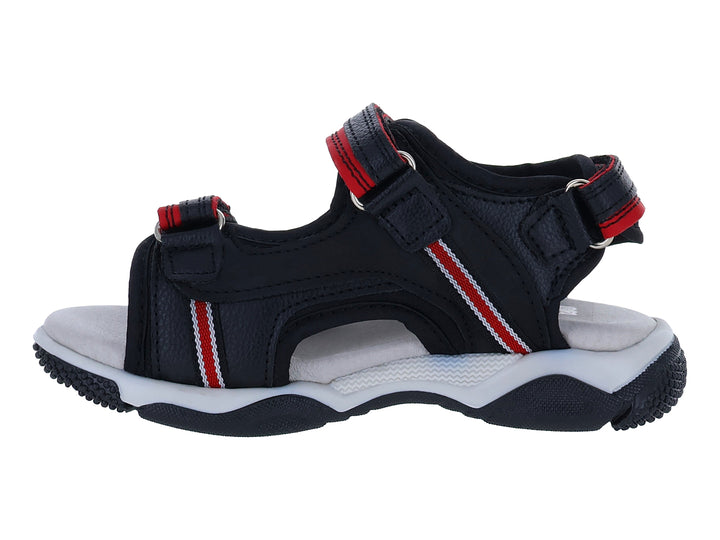Sandalia New Boys color negro con detalles en rojo y suela blanca.