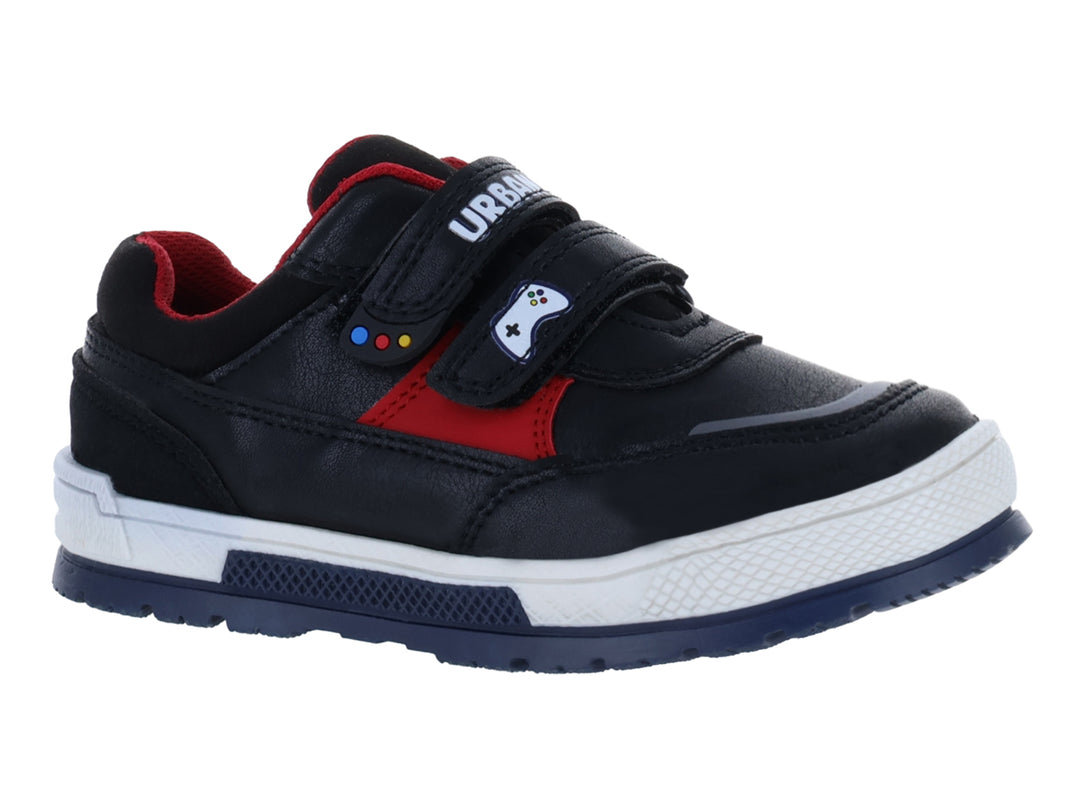 Zapato infantil negro con detalles rojos, suela blanca y azul, y cierre de velcro.