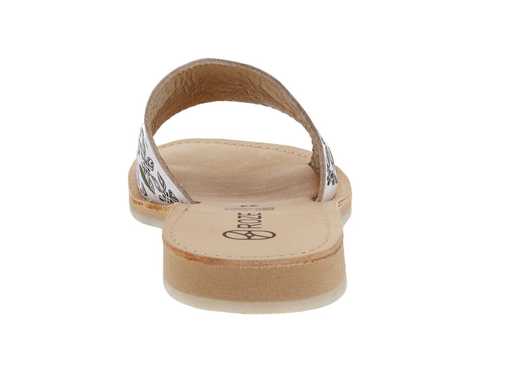 Sandalia blanca para niña con diseño de flores coloridas en la banda superior y suela beige.