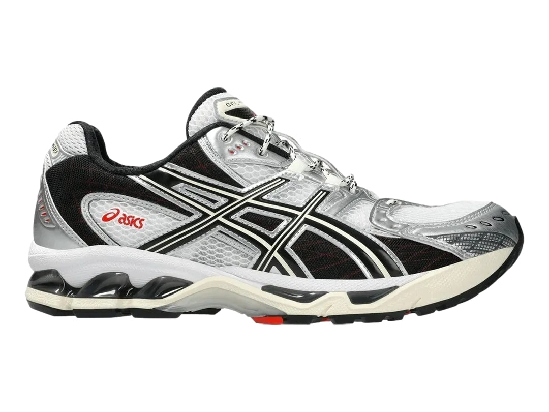 Tenis deportivos ASICS Gel-Nimbus 10.1 en colores blanco, negro y gris con detalles en rojo.