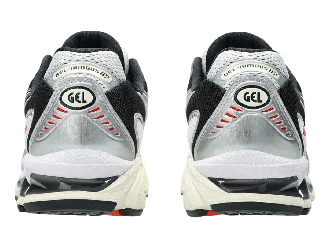 Tenis deportivos ASICS Gel-Nimbus 10.1 en colores blanco, negro y gris con detalles en rojo.
