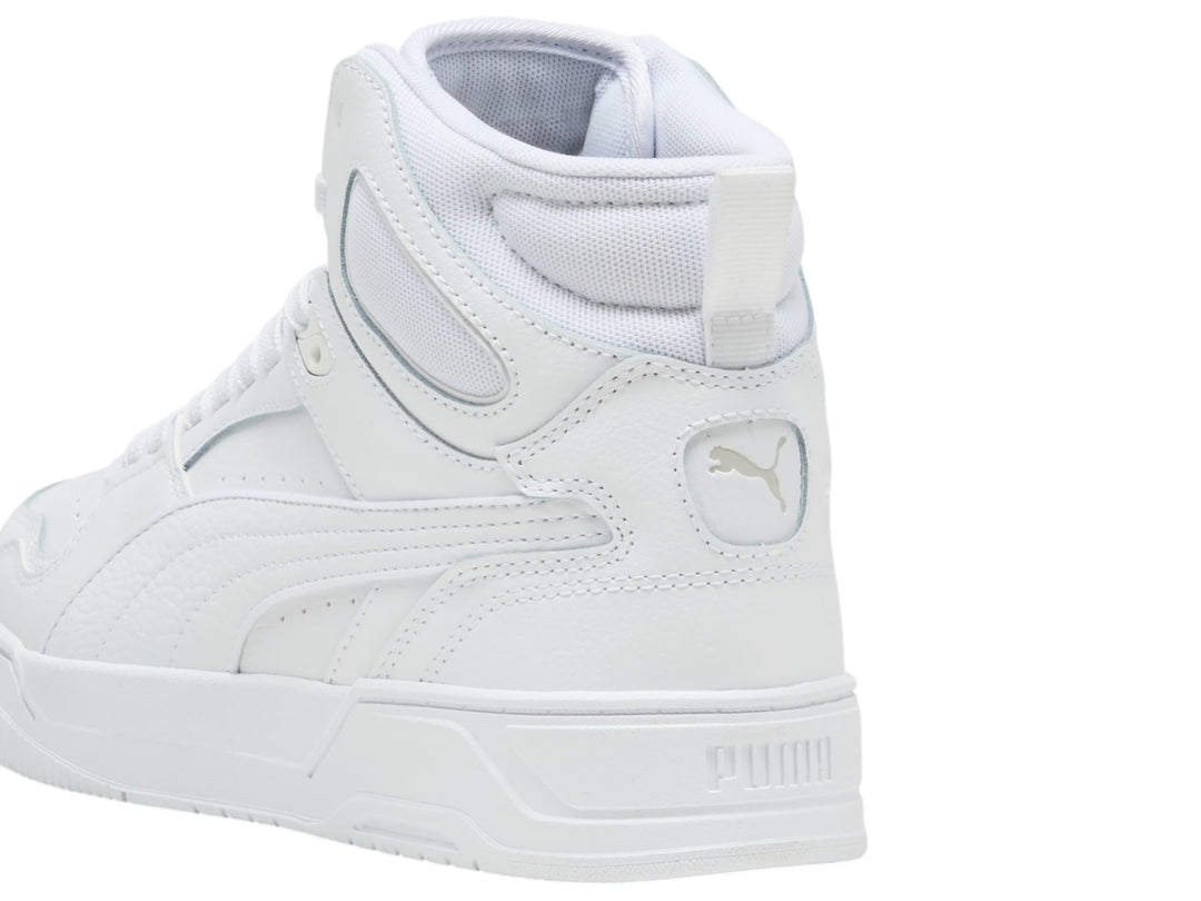 Tenis PUMA RBD Break Mid color blanco, diseño deportivo de corte medio con cordones.