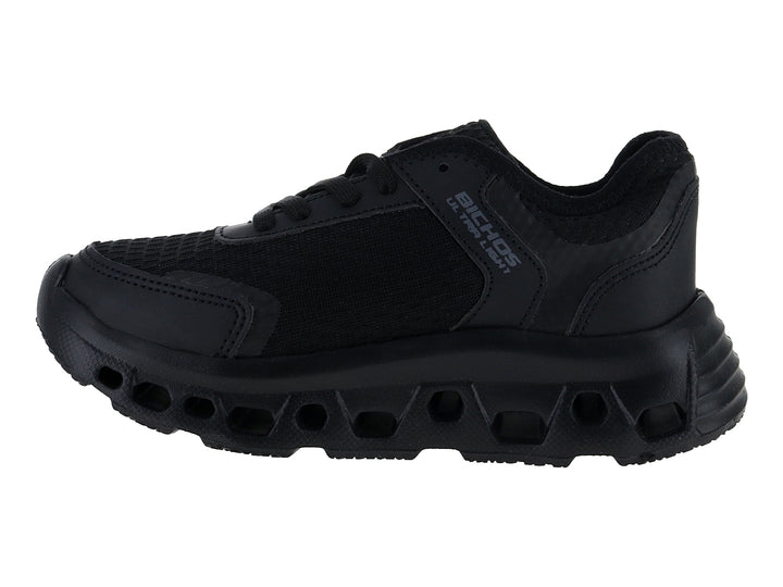 Tenis deportivos infantiles color negro total con suela gruesa y tejido de malla.