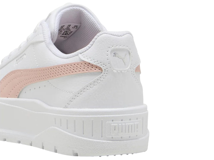 Tenis PUMA blancos con detalle lateral rosa y suela de plataforma.