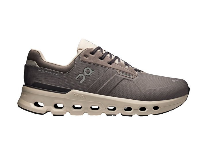 Tenis deportivos On Cloud color gris eclipse con suela beige y diseño moderno.